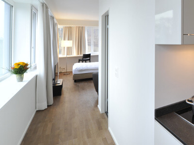 Kitchen, bed, floor, a lot of windows